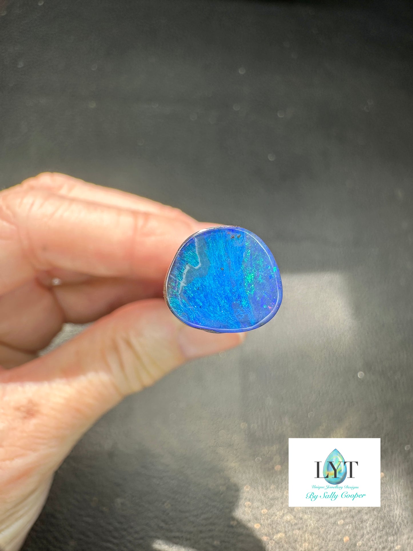 Bay of Blues and Green Boulder Opal rings