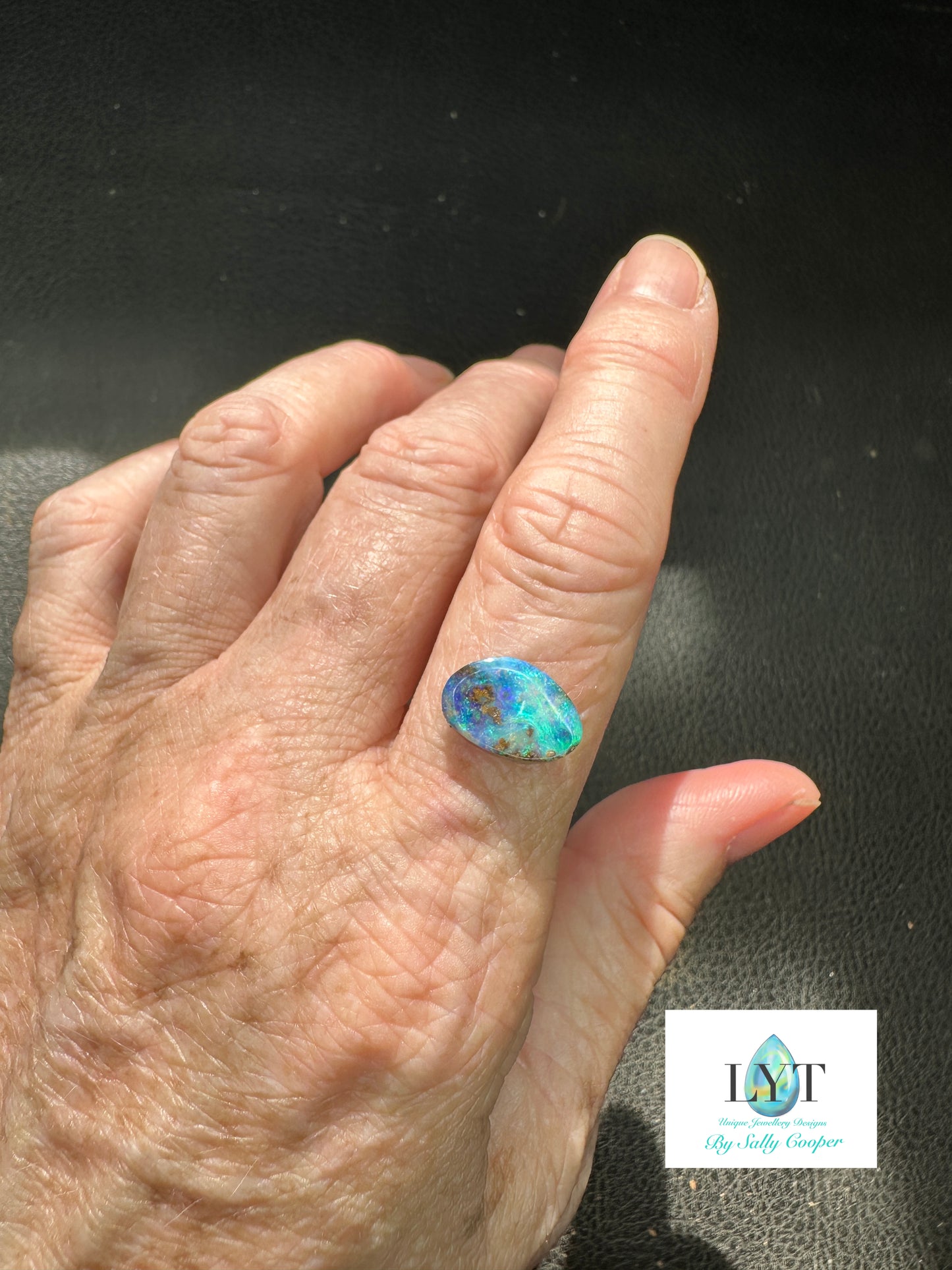 Bay of Blues and Green Boulder Opal rings