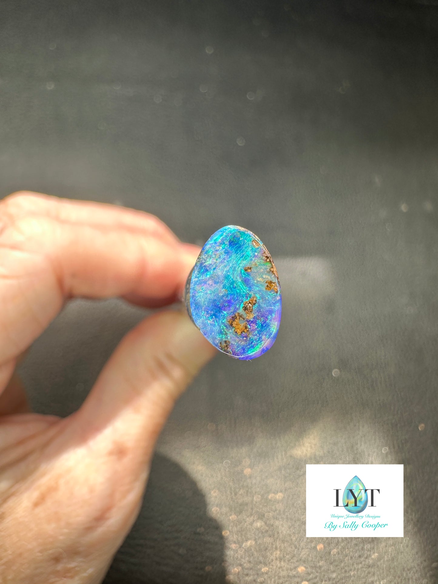 Bay of Blues and Green Boulder Opal rings